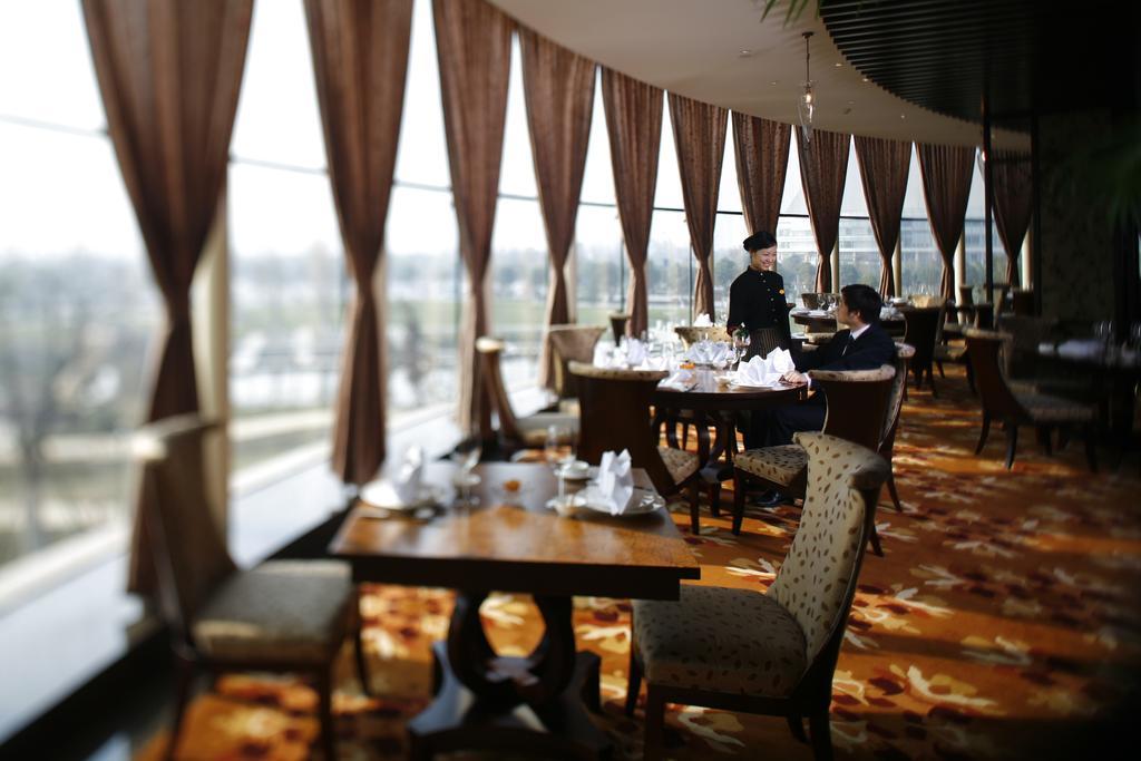 New Century Grand Hotel Ningbo Exteriör bild